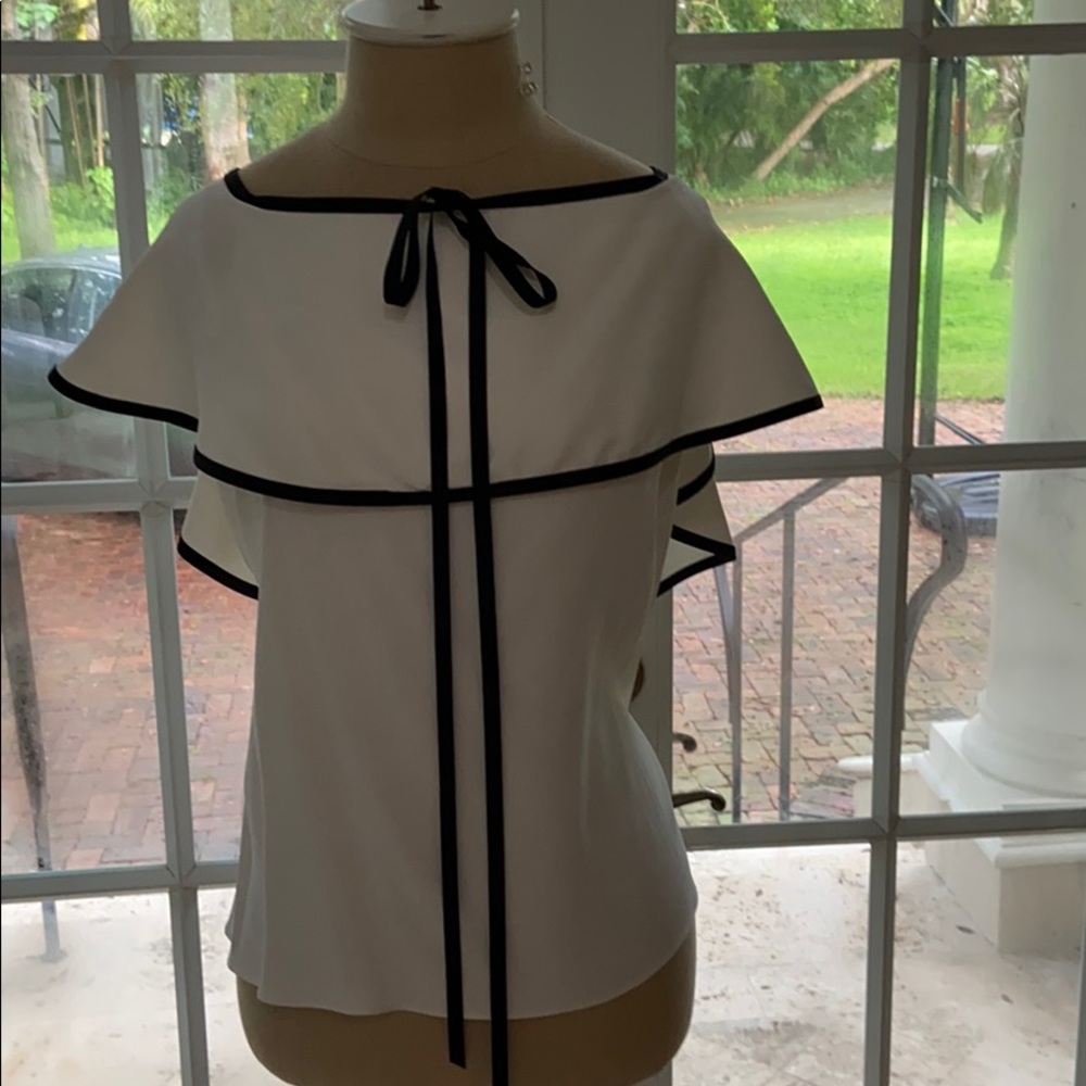 Off the shoulder white top with black piping
